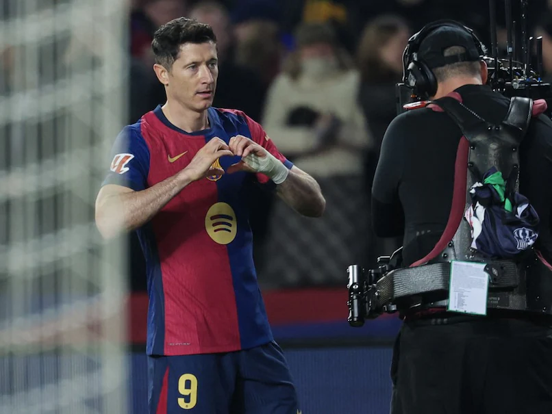 Lewandowski's Brace Propels Barcelona to Victory Over Rayo Vallecano and Top of La Liga Standings